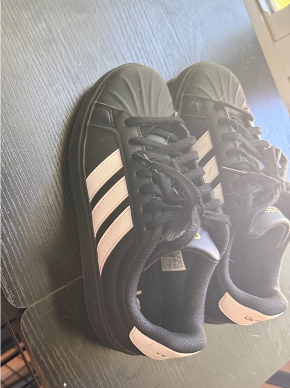 Classic adidas sneakers, women’s 6.5